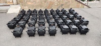 A "tiny" army of trench stoves (they stopped at 1000!) he and other volunteers made last year.